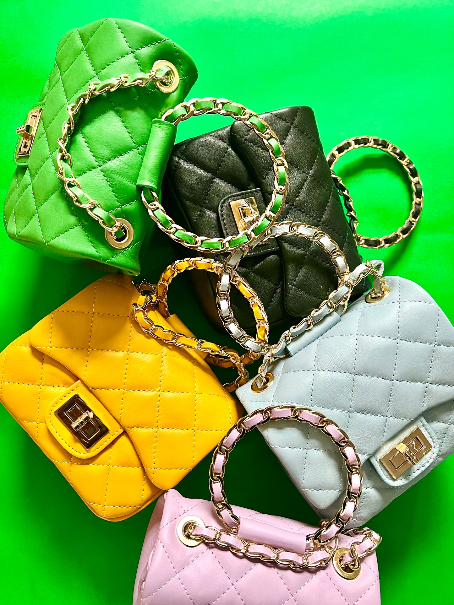 O Top-handle Quilted Mini Bag